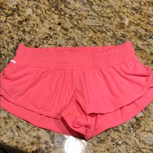 Pink lulu lemon shorts. Size 8. Lightly used.